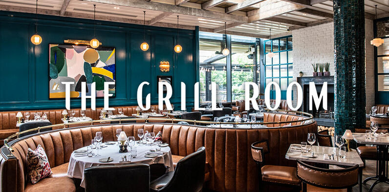 Banquette seating and tables at The Grill Room